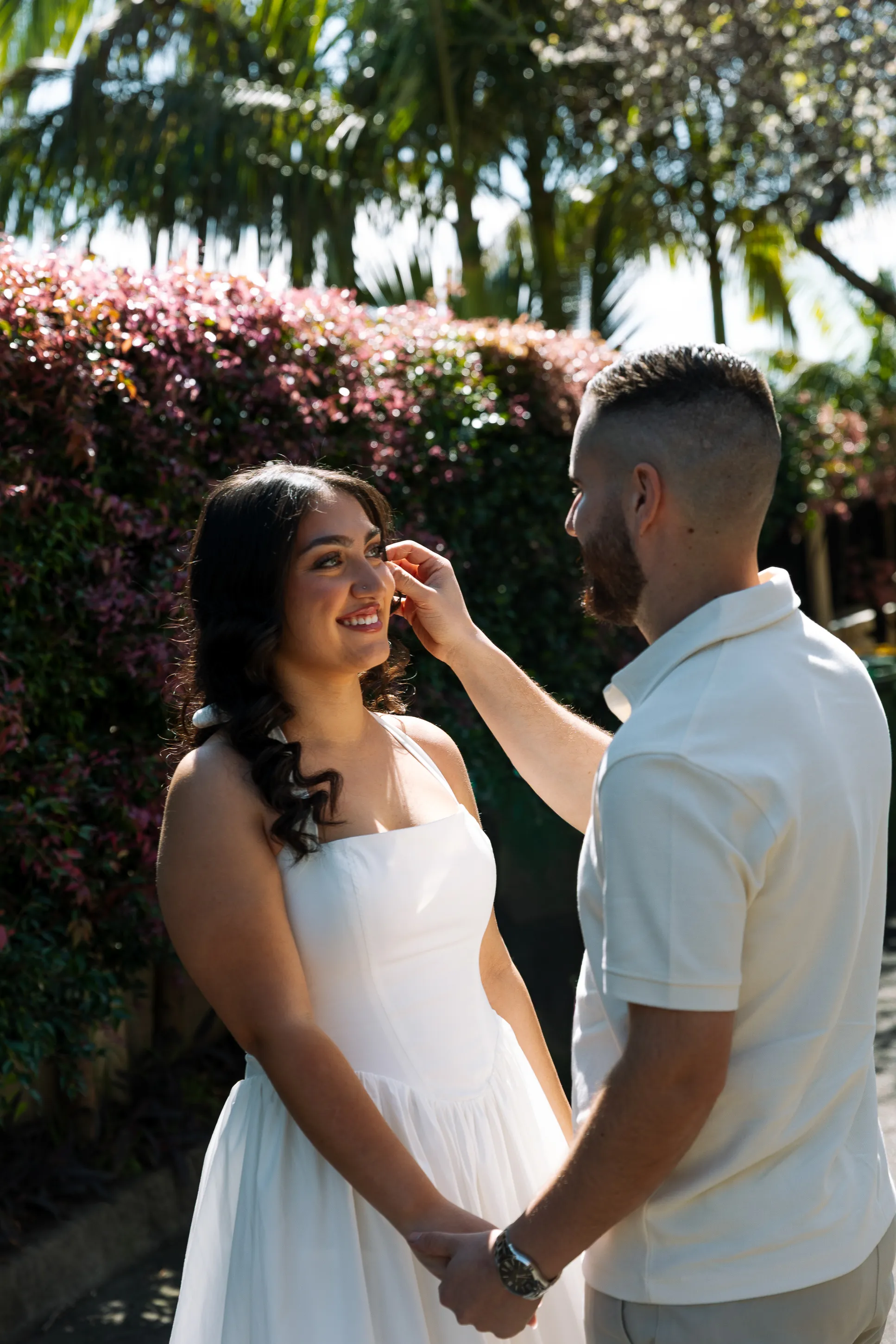 Golden-hour engagement portrait with intimate framing and natural expression in Sydney